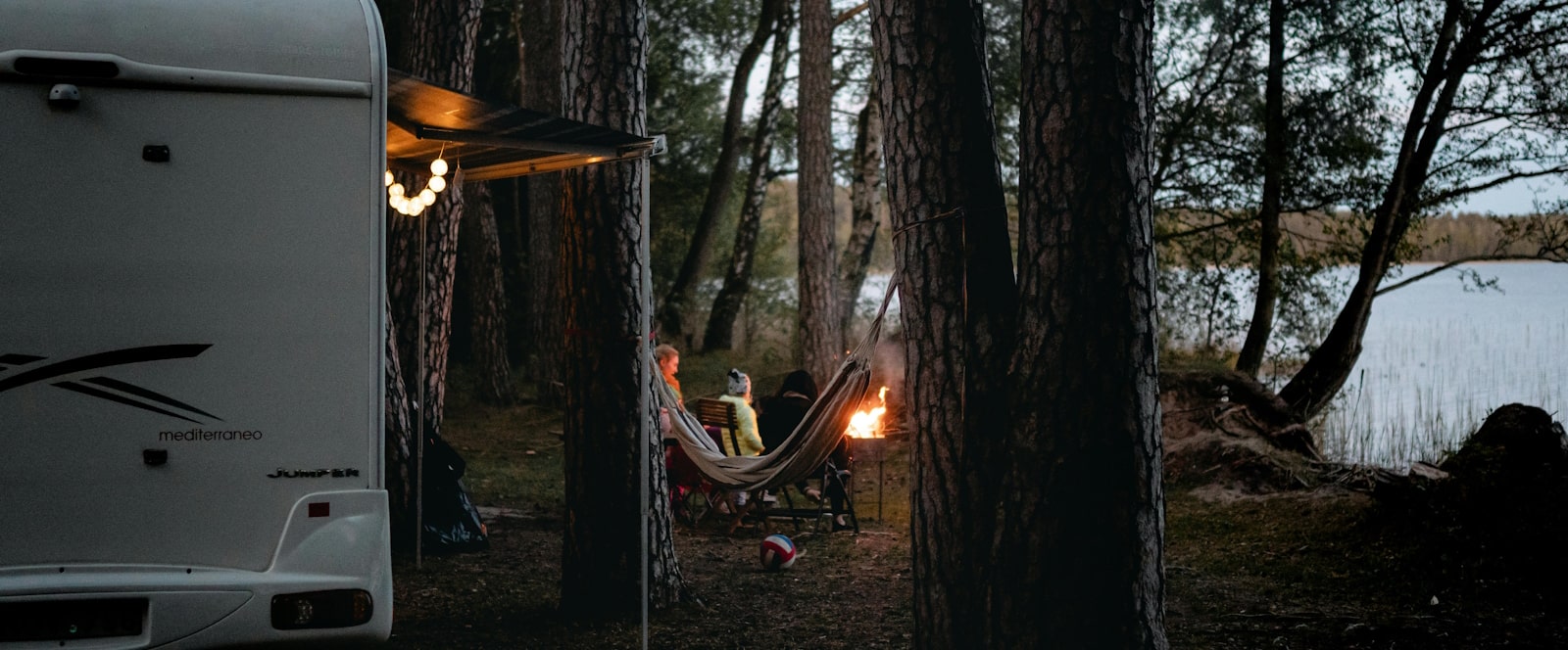 camper at lake