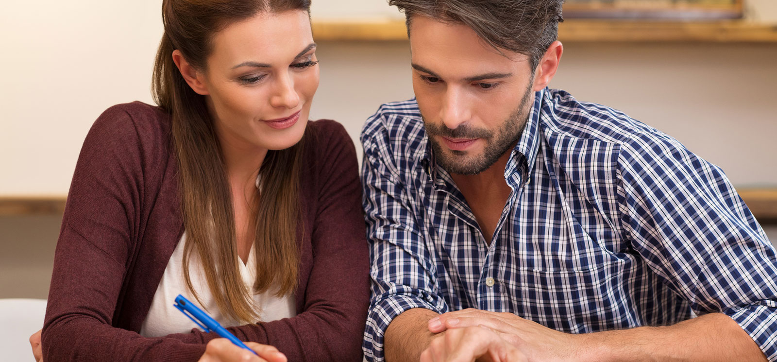 couple looking over paperwork