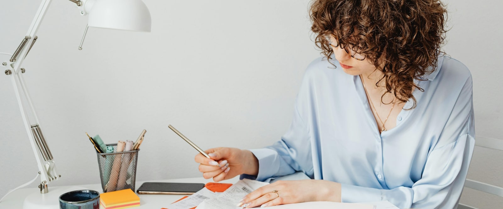 woman working on papers